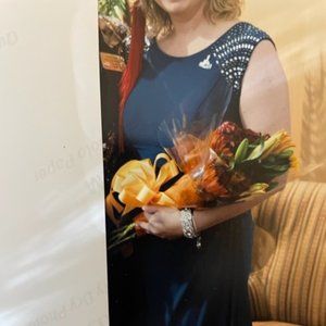 Formal teal dress with jeweled shoulders